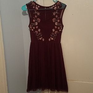 Burgundy dress.